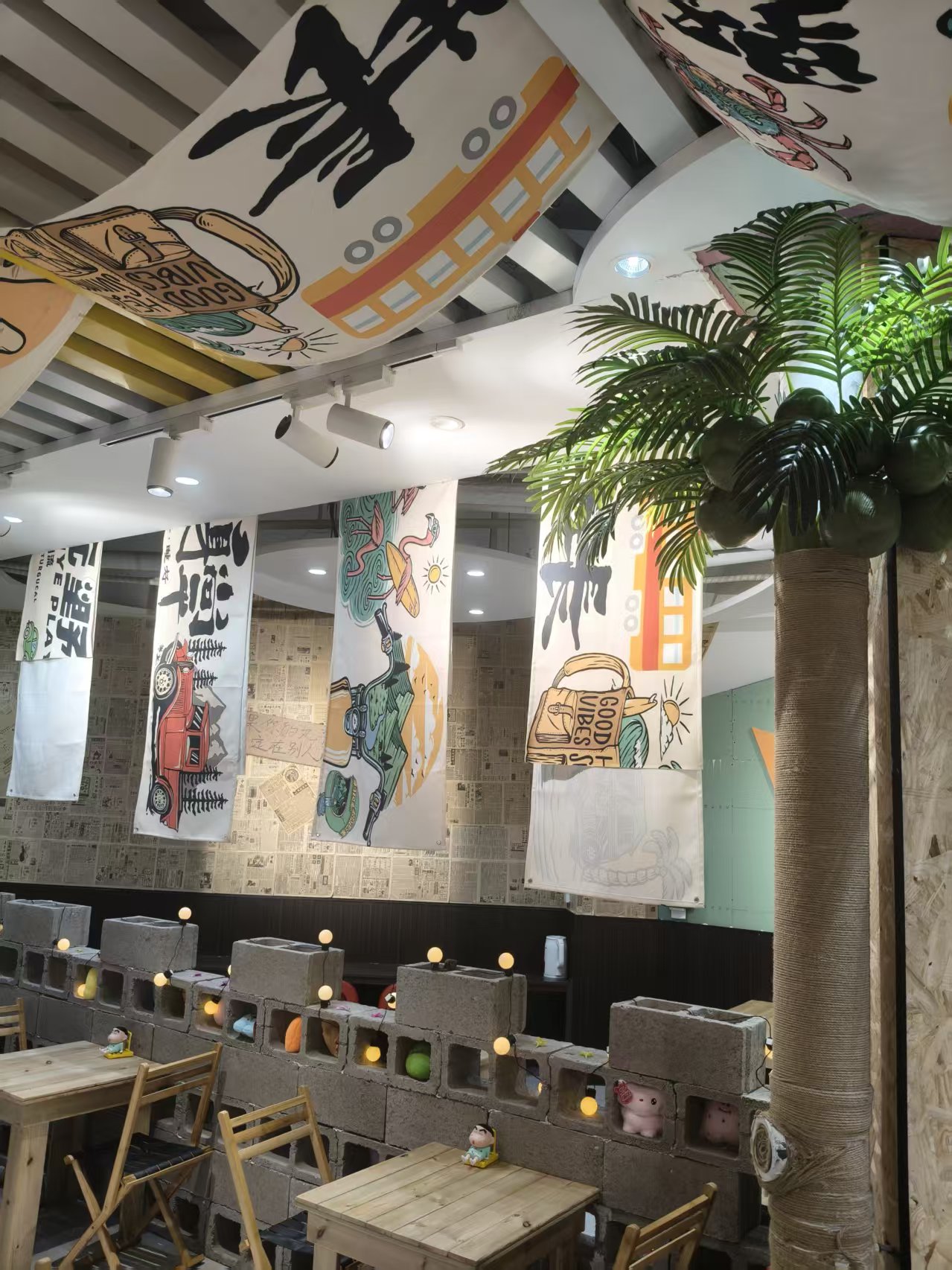 Decorative banners and dining tables