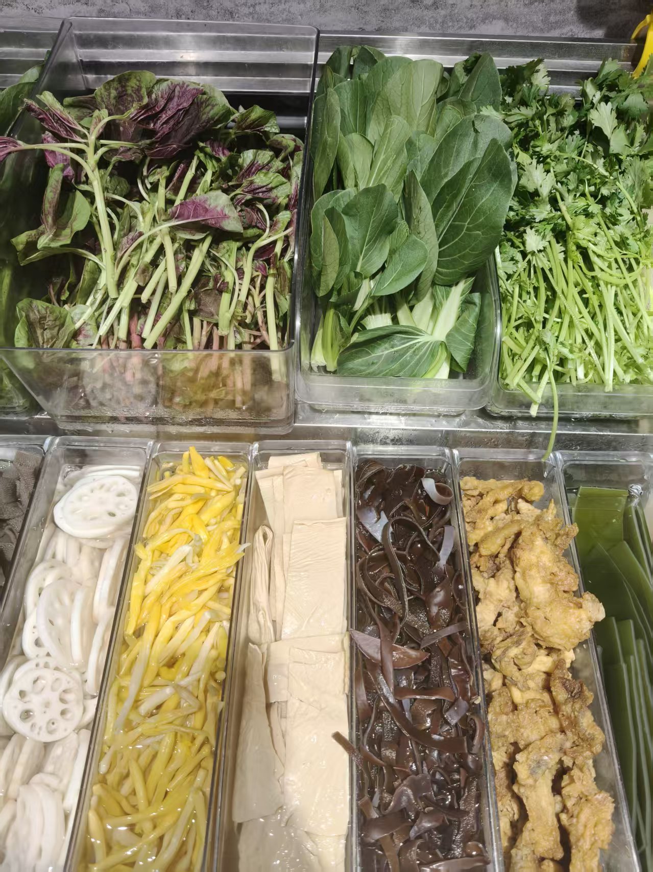 Vegetables, lotus root, tofu and fried chicken toppings