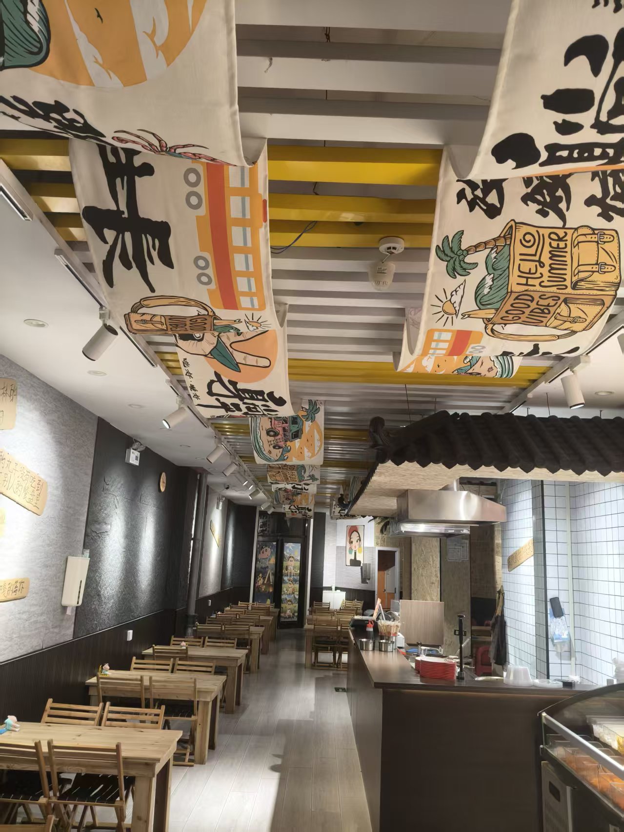 Dining room with colorful signs and tables